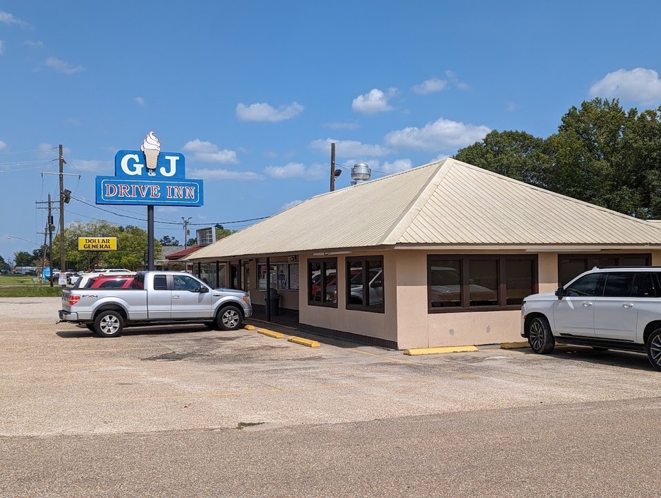 Classic diner exterior with roadside parking