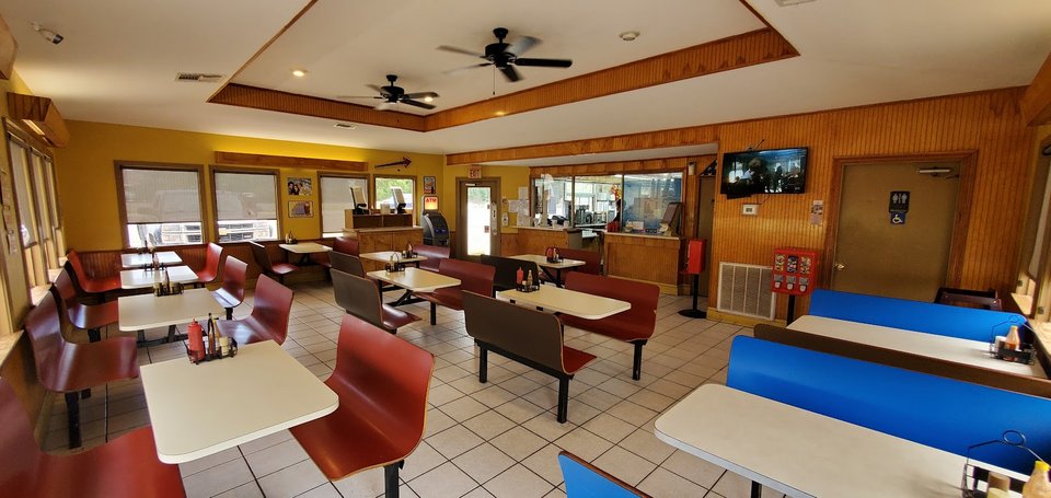 Classic diner exterior with roadside parking